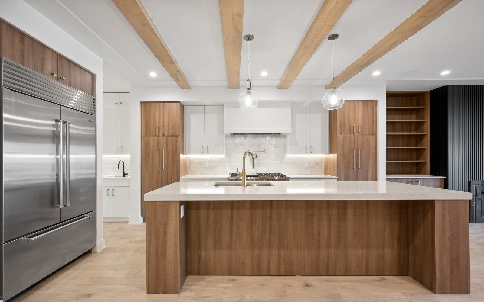 Two-tone kitchen with walnut-tone island
